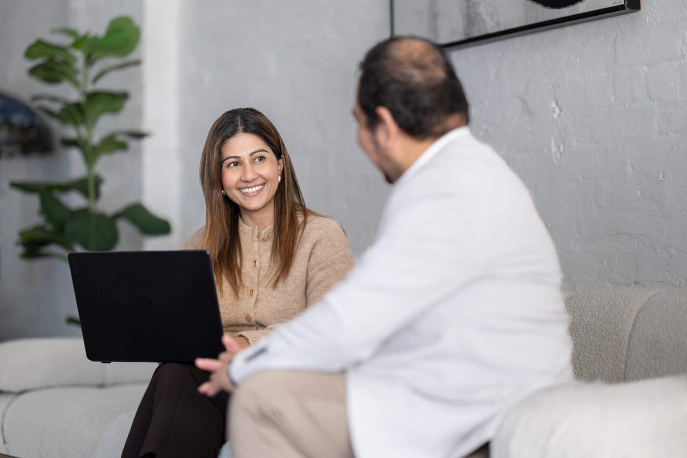 Rukshani Perera and Ian Pelayo discussing business